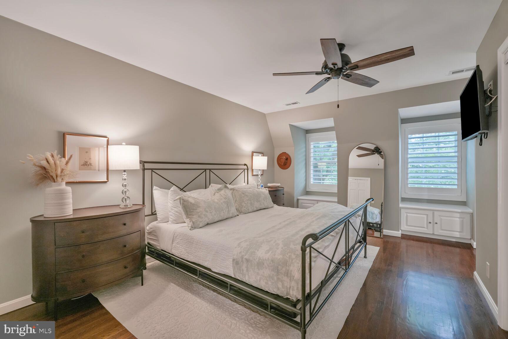 2327 North Glebe Road Arlington, VA 22207 - Photo 13 of 25 a bedroom with a bed and wooden floor