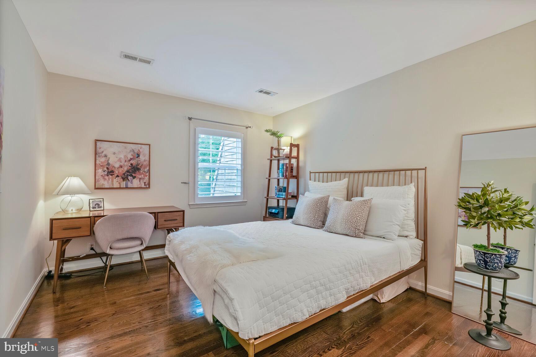 2327 North Glebe Road Arlington, VA 22207 - Photo 16 of 25 a bedroom with a bed and window