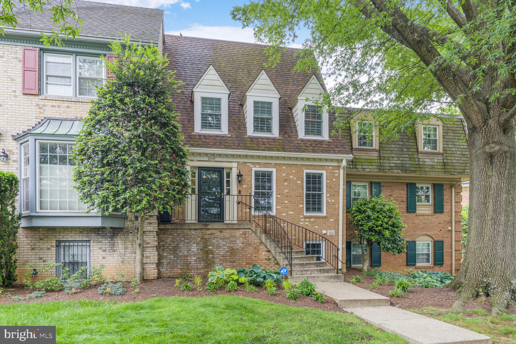 2327 North Glebe Road Arlington, VA 22207 - Photo 2 of 25 front view of a house with a yard