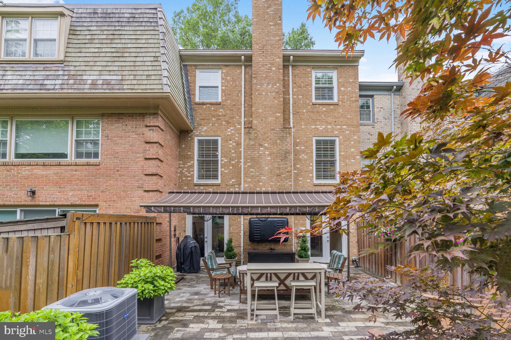 2327 North Glebe Road Arlington, VA 22207 - Photo 24 of 25 a view of a patio with table and chairs and potted plants