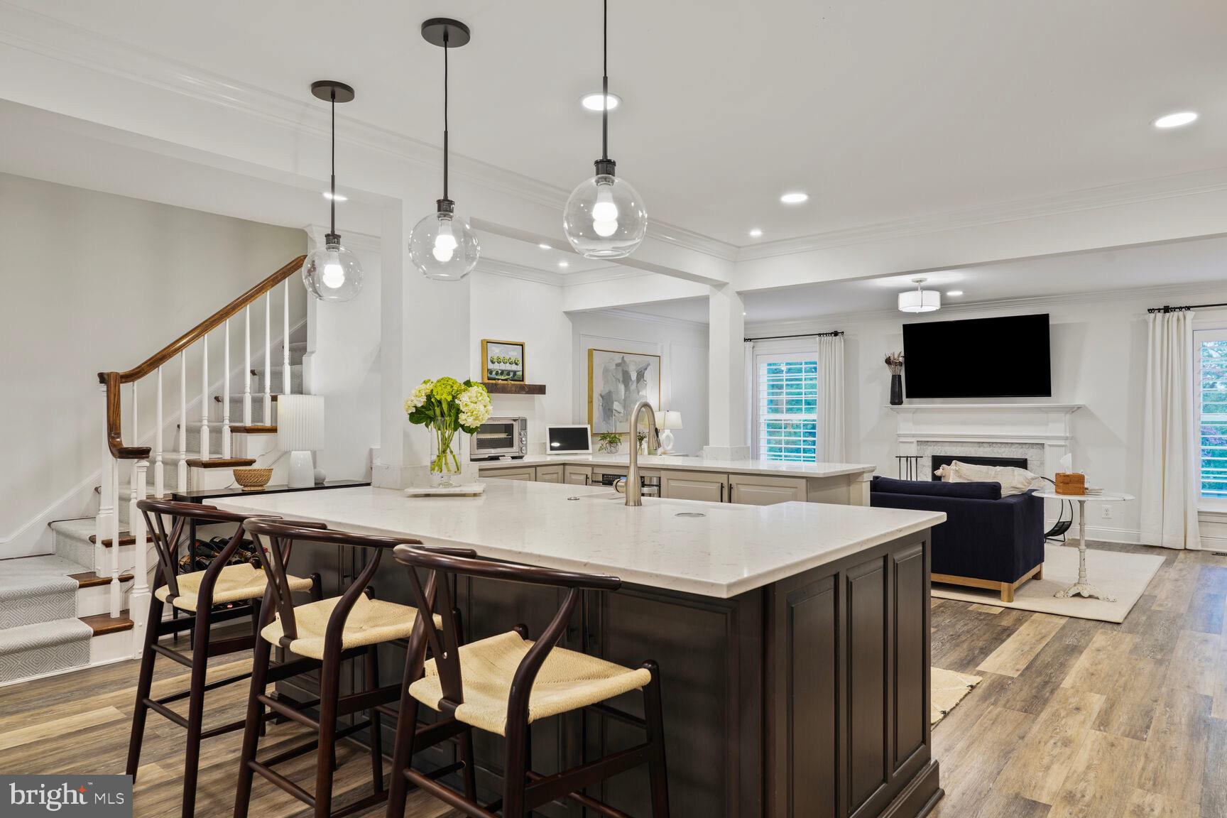 2327 North Glebe Road Arlington, VA 22207 - Photo 7 of 25 a view of kitchen with cabinets table and chairs