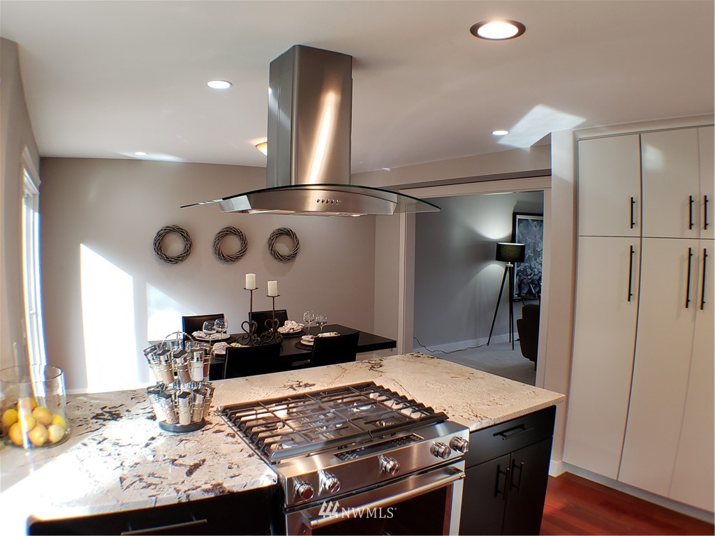 502 224 Place Southeast Bothell, WA 98021 - Photo 12 of 39 a kitchen with a stove and a refrigerator