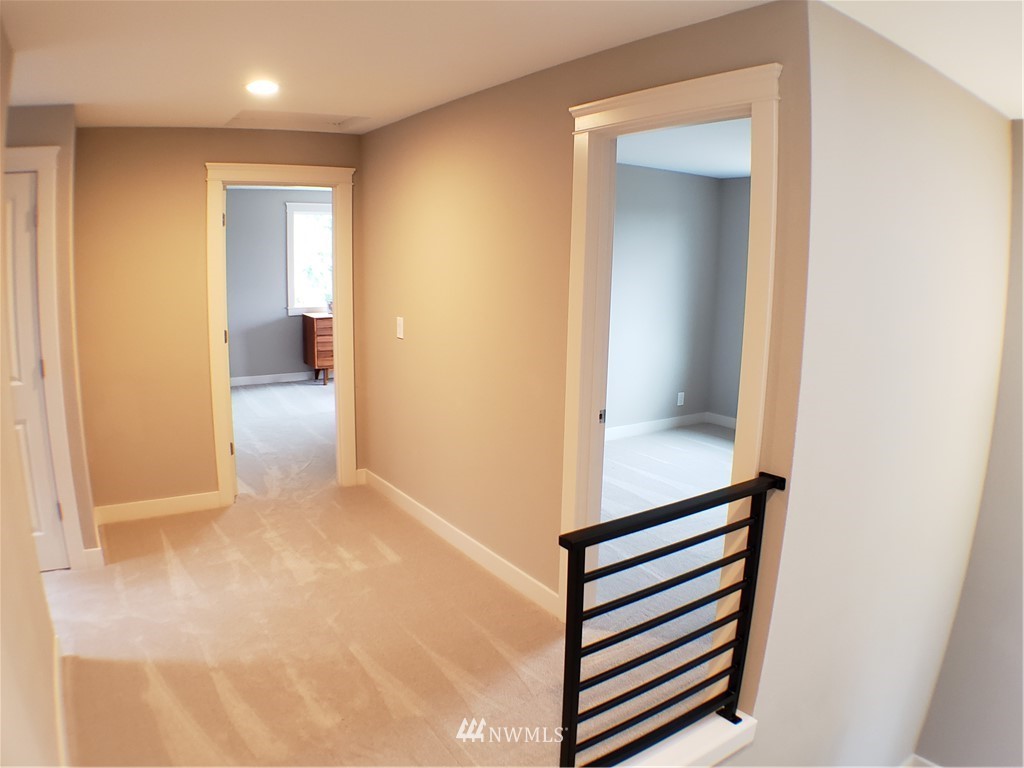 502 224 Place Southeast Bothell, WA 98021 - Photo 16 of 39 a view of a hallway with a elevator