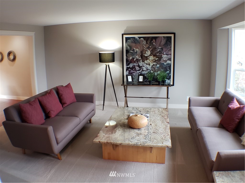 502 224 Place Southeast Bothell, WA 98021 - Photo 3 of 39 a living room with furniture and a potted plant