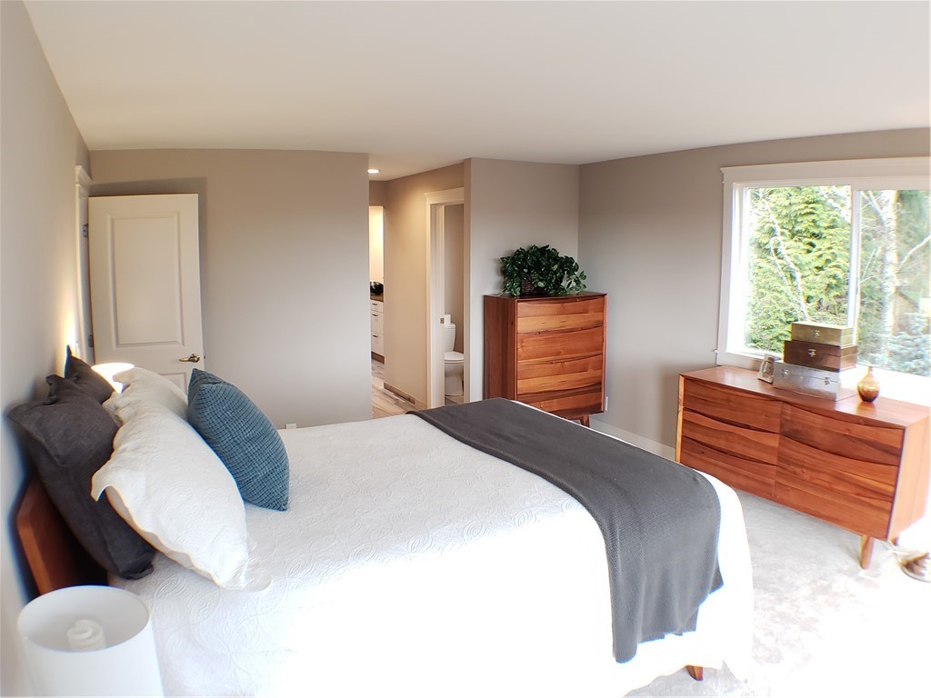 502 224 Place Southeast Bothell, WA 98021 - Photo 23 of 39 a bedroom with a bed and a window