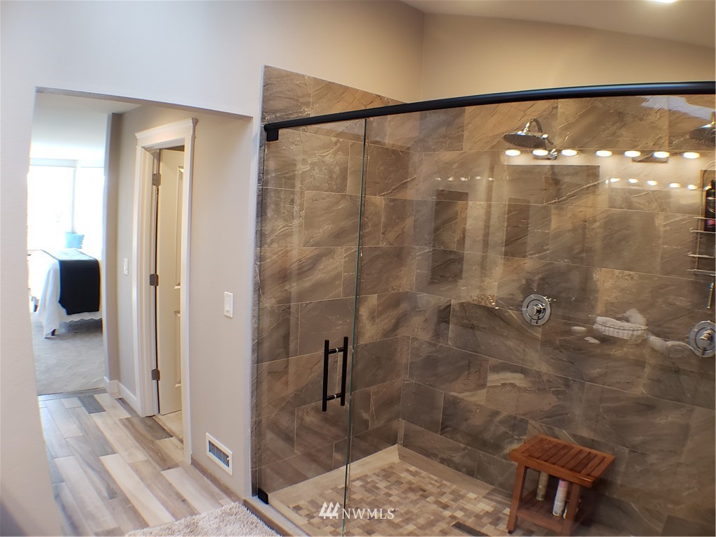 502 224 Place Southeast Bothell, WA 98021 - Photo 26 of 39 a bathroom with a shower and a sink