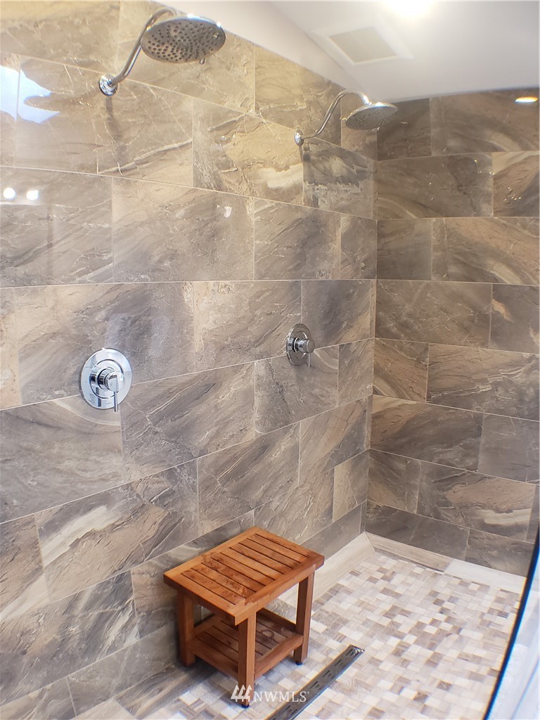 502 224 Place Southeast Bothell, WA 98021 - Photo 27 of 39 a bathroom with a shower