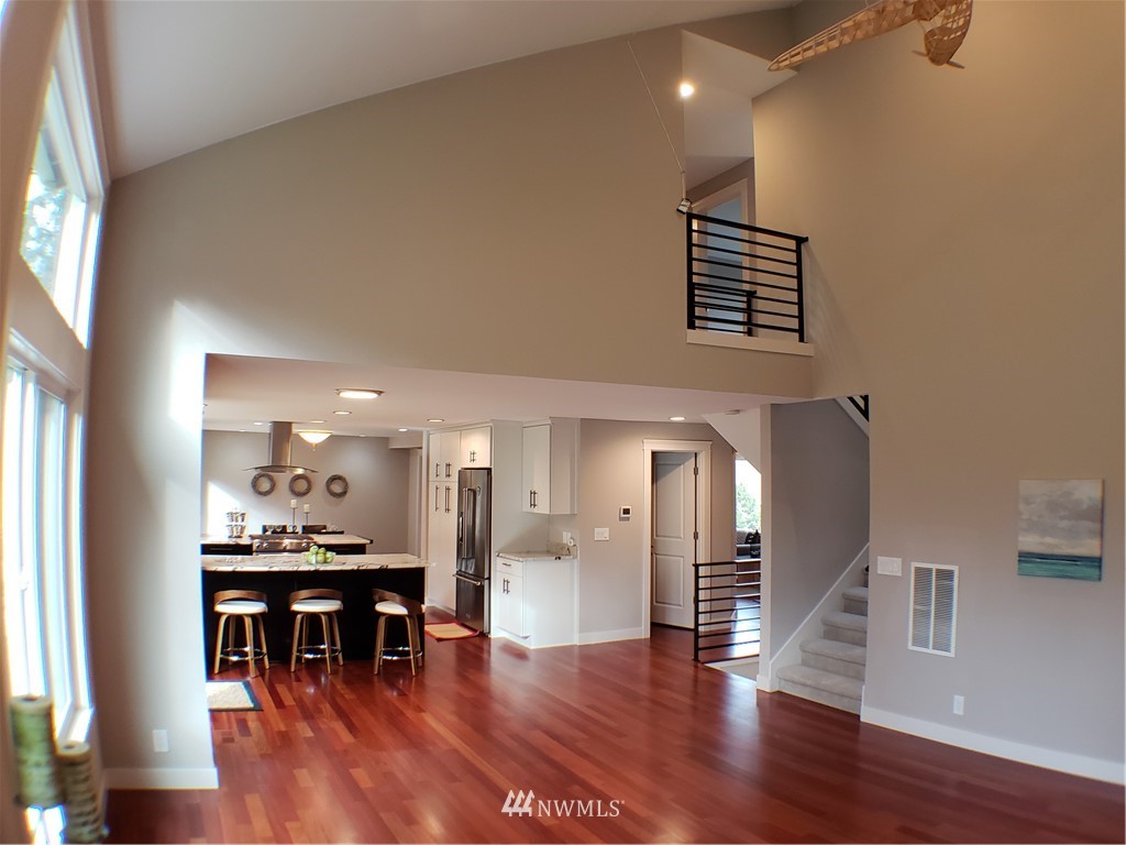 502 224 Place Southeast Bothell, WA 98021 - Photo 4 of 39 a view of kitchen with furniture and wooden floor