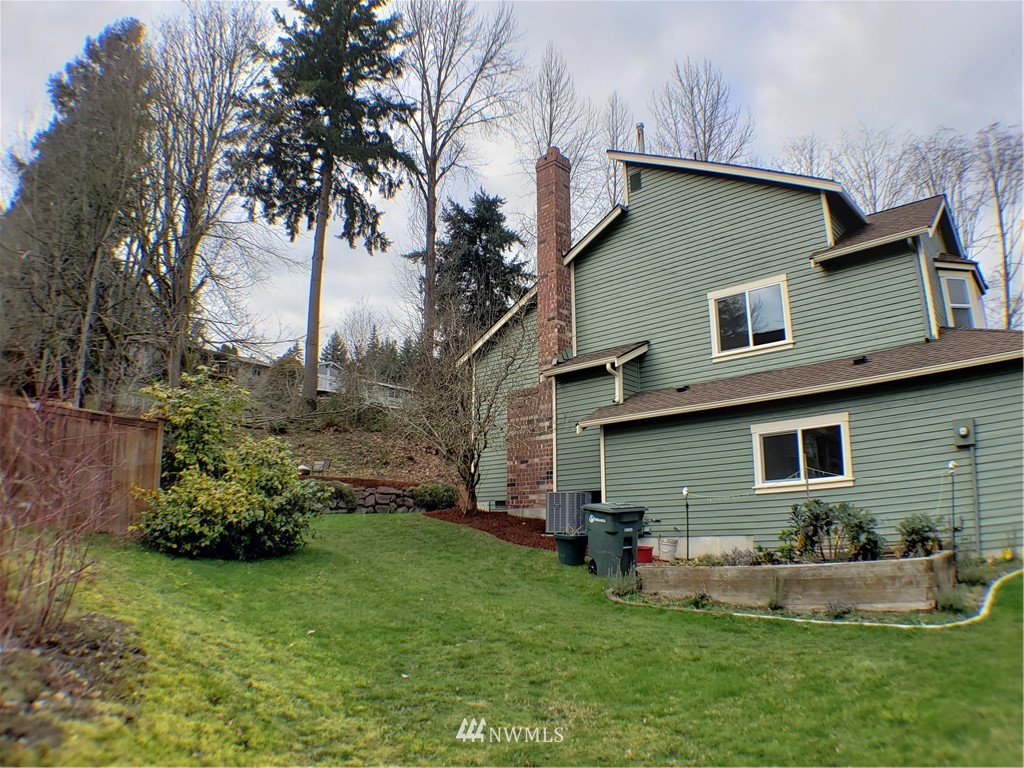 502 224 Place Southeast Bothell, WA 98021 - Photo 34 of 39 a front view of house with yard and outdoor seating