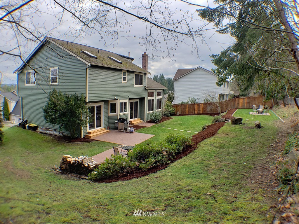 502 224 Place Southeast Bothell, WA 98021 - Photo 36 of 39 a front view of a house with garden