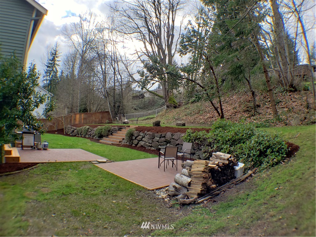 502 224 Place Southeast Bothell, WA 98021 - Photo 37 of 39 a view of a backyard with sitting area