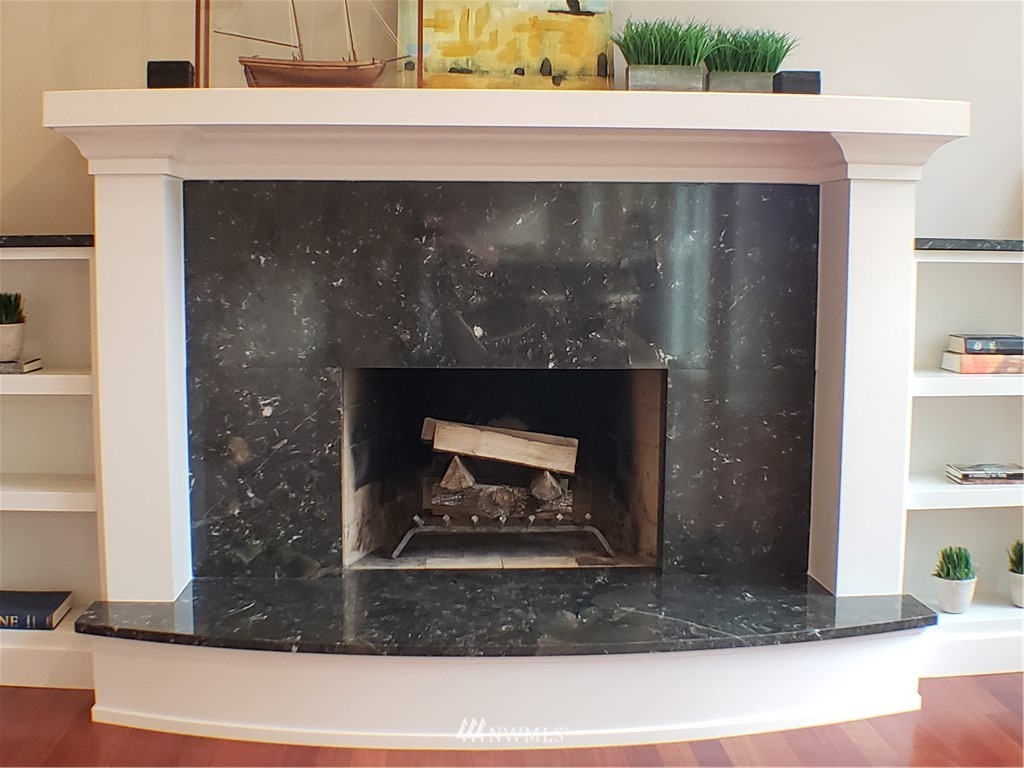 502 224 Place Southeast Bothell, WA 98021 - Photo 7 of 39 a fireplace with glass top