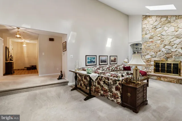 a bed room with a bed and a large mirror