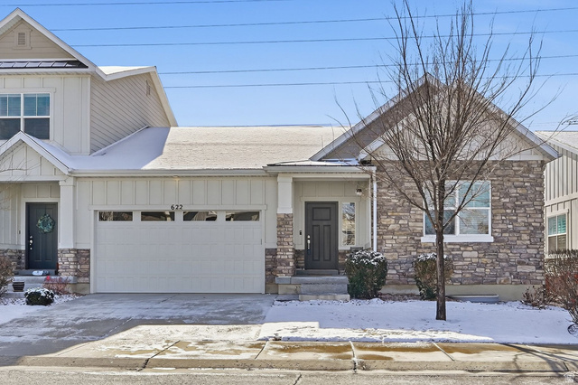 622 Sawback Lane Draper, UT 84020 - Photo 1 of 1 View of front of home featuring stone siding, concrete driveway, an attached garage, and board and batten siding