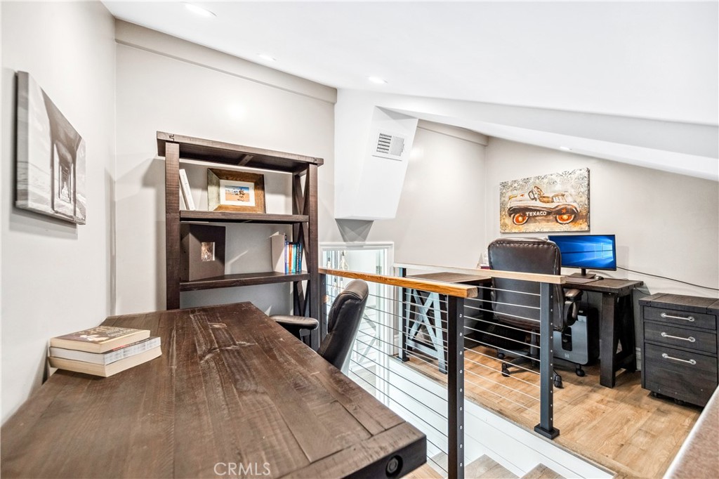 5522 Mossvale Circle Huntington Beach, CA 92649 - Photo 55 of 61 Adorable loft workspace with room for two desks and flexible use.