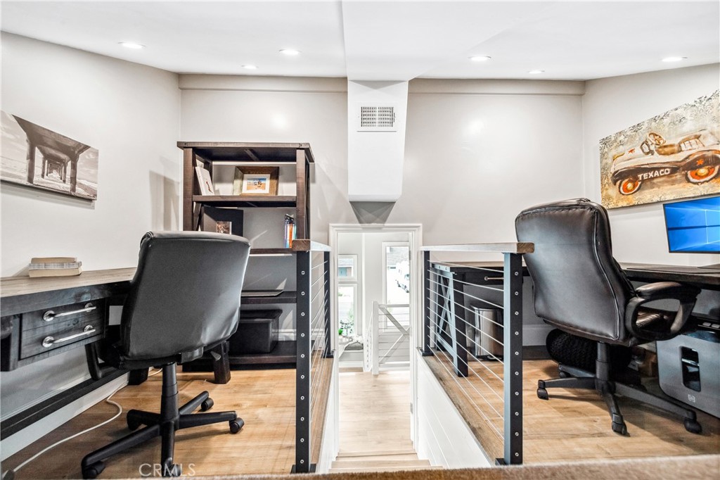5522 Mossvale Circle Huntington Beach, CA 92649 - Photo 57 of 61 Adorable loft workspace with room for two desks and flexible use.