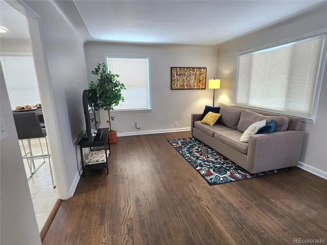 a living room with furniture and a couch