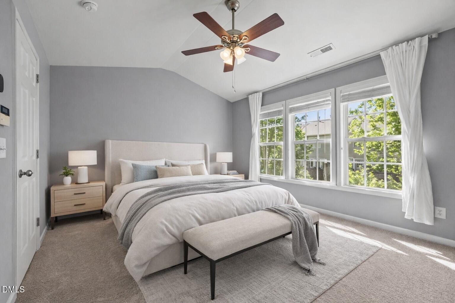 5537 Red Robin Road Raleigh, NC 27613 - Photo 13 of 33 a bedroom with a bed and window