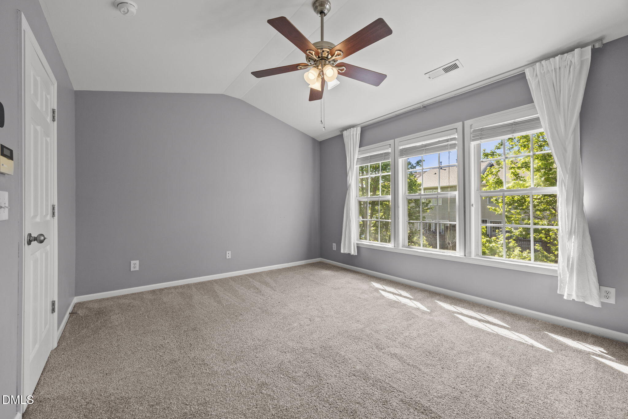 5537 Red Robin Road Raleigh, NC 27613 - Photo 14 of 33 a view of an empty room with a window