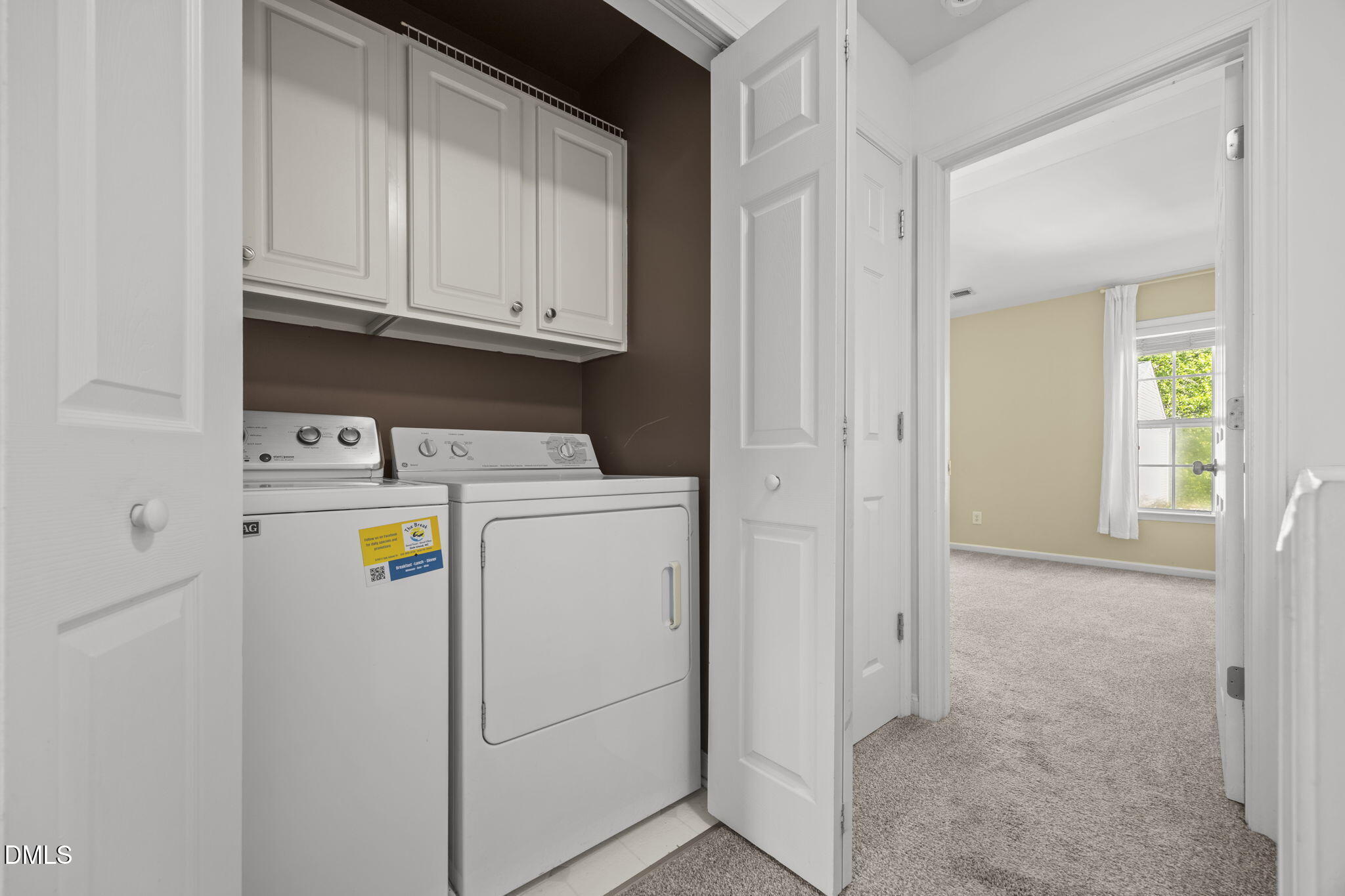 5537 Red Robin Road Raleigh, NC 27613 - Photo 22 of 33 a utility room with dryer and washer
