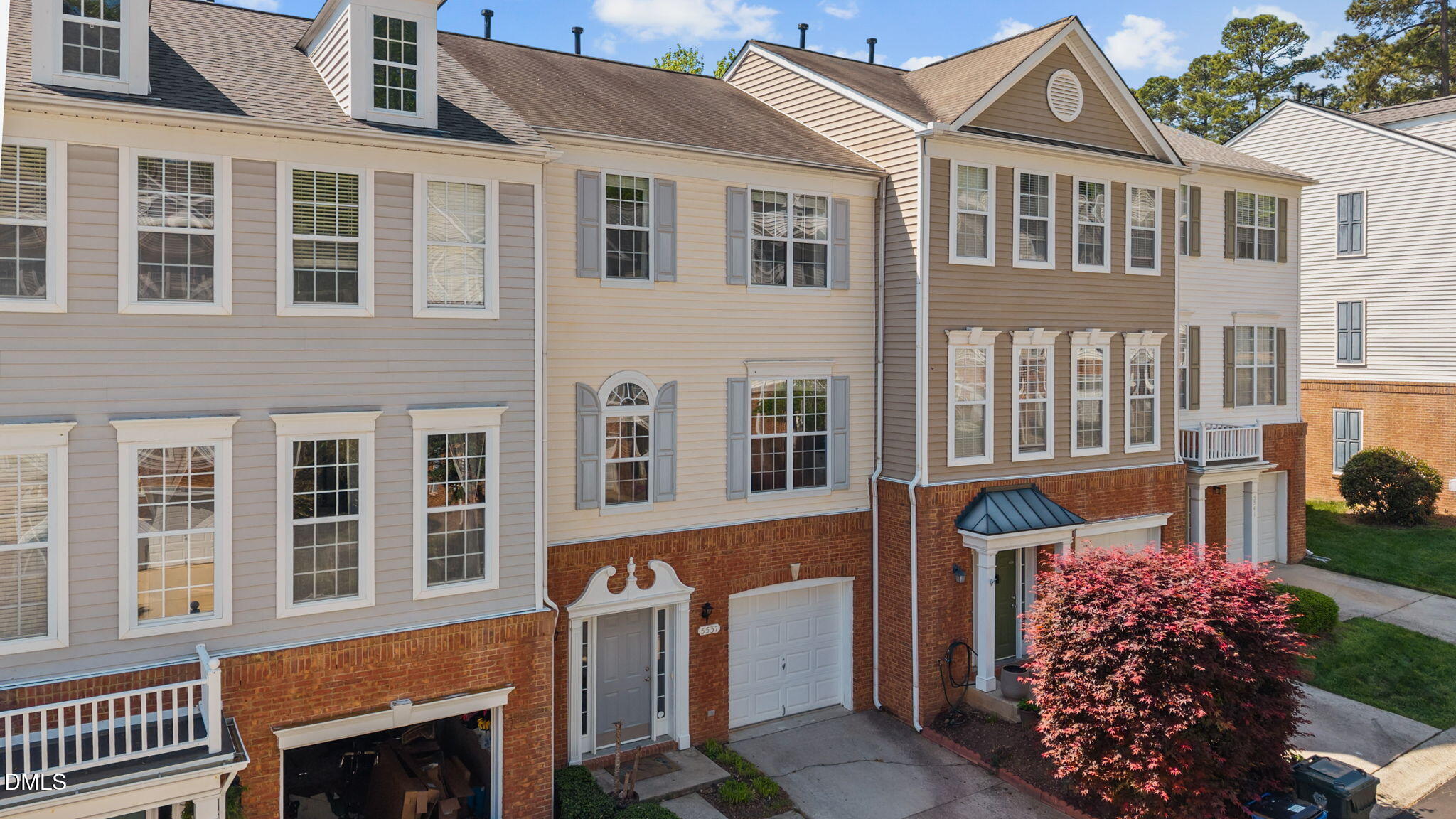 5537 Red Robin Road Raleigh, NC 27613 - Photo 2 of 33 a front view of a house with a garden