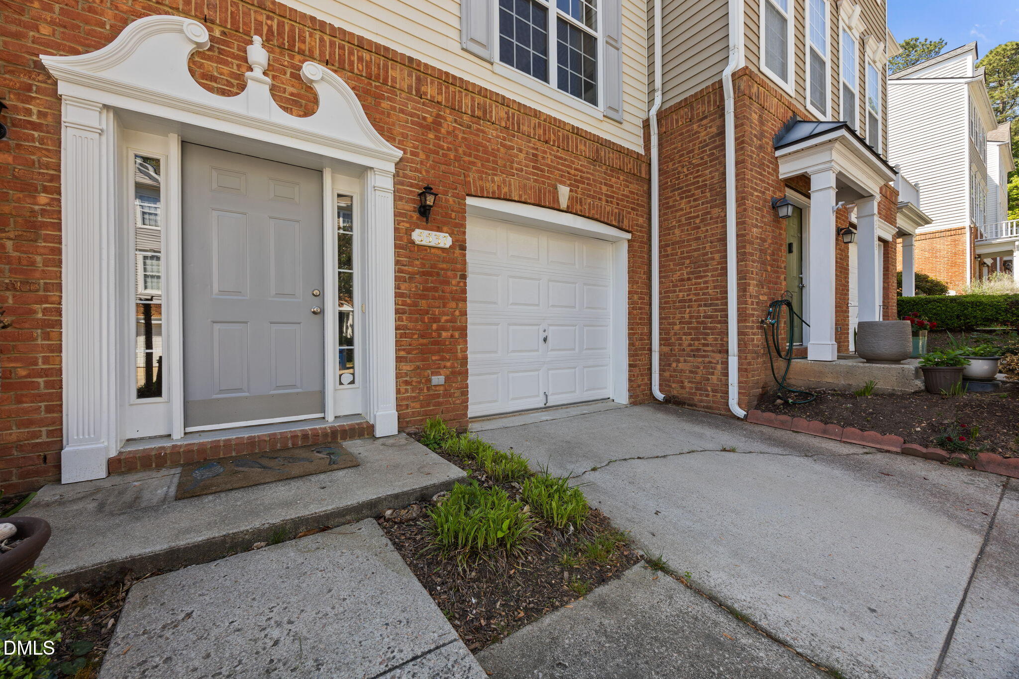5537 Red Robin Road Raleigh, NC 27613 - Photo 3 of 33 a front view of a house with a yard
