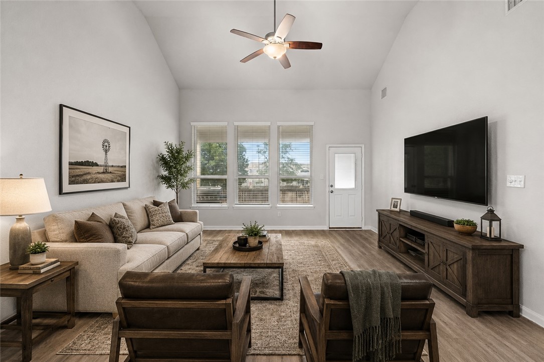 4702 Nopalitos Way Bryan, TX 77807 - Photo 10 of 27 a living room with furniture and a flat screen tv