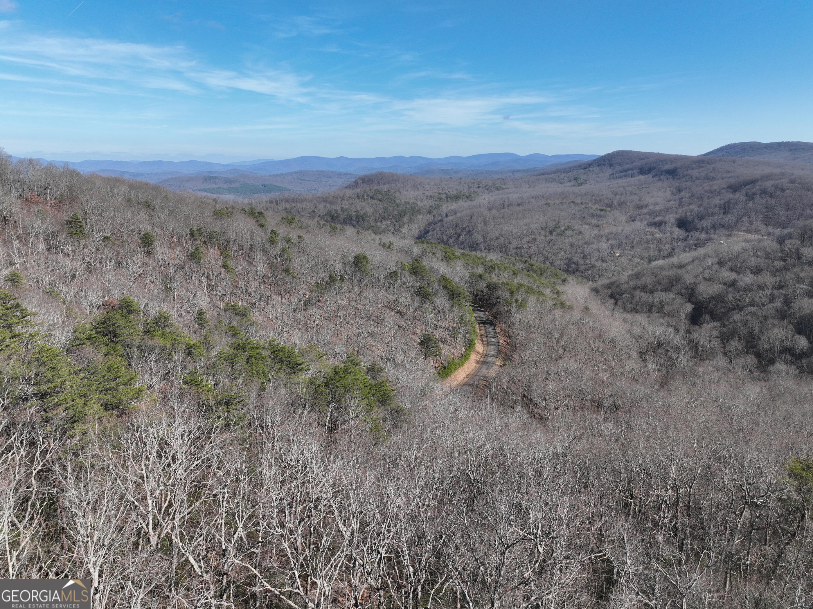 246 Andes Ridge Jasper, GA 30143 - Photo 18 of 39 a view of a dry field with mountains in the background