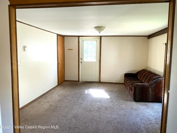 a view of livingroom with furniture
