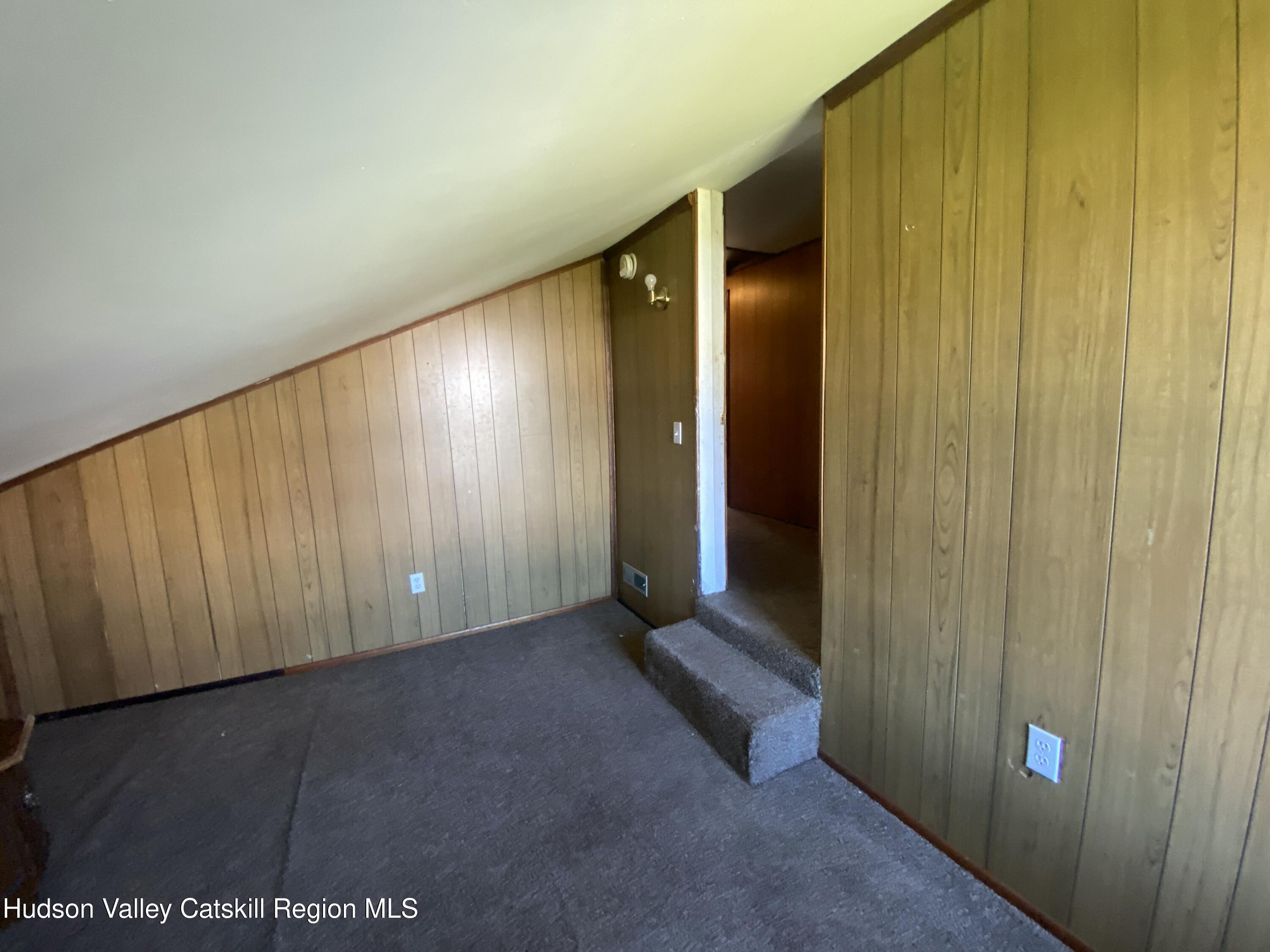 53654 Highway 30 Roxbury, NY 12474 - Photo 15 of 18 a view of an empty room with wooden walls