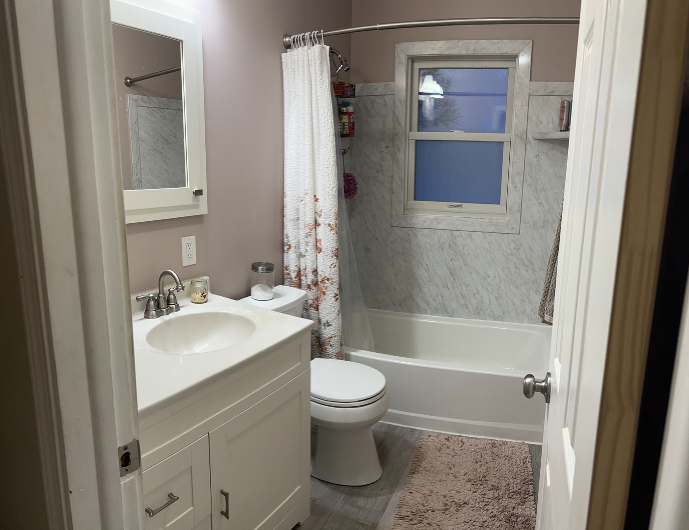201 Kent Road McHenry, IL 60051 - Photo 23 of 25 a bathroom with a sink toilet and shower