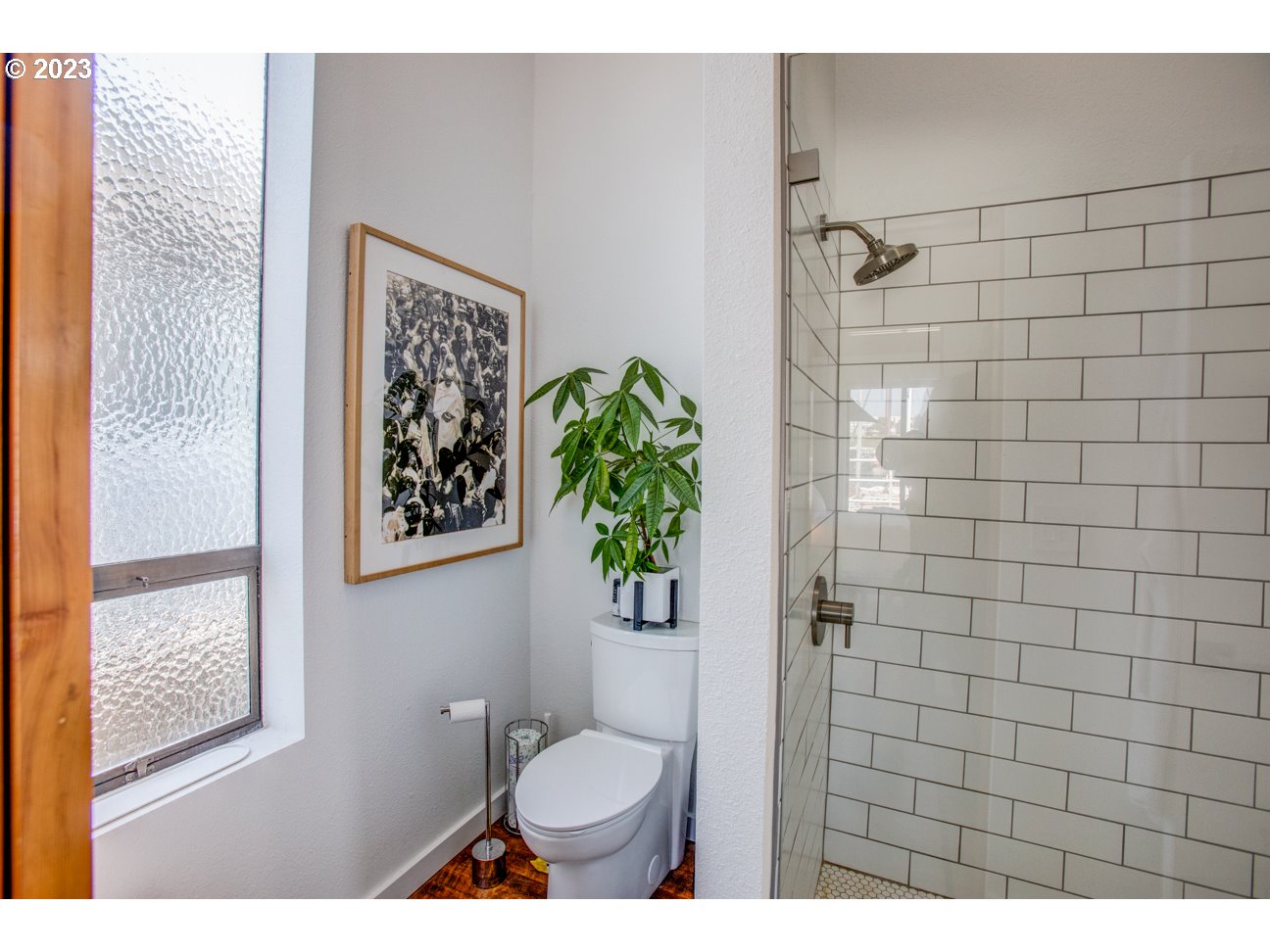 173 Northeast Bridgeton Road, Unit 24 Portland, OR 97211 - Photo 24 of 36 a bathroom with a toilet and a shower