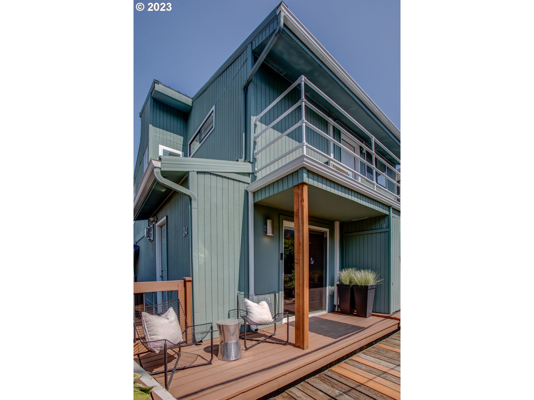 173 Northeast Bridgeton Road, Unit 24 Portland, OR 97211 - Photo 3 of 36 a view of living room and utility room