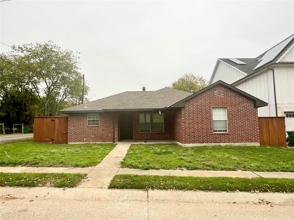 601 Short Street McKinney, TX 75069 - Photo 2 of 28 a view of a house with a yard and large tree