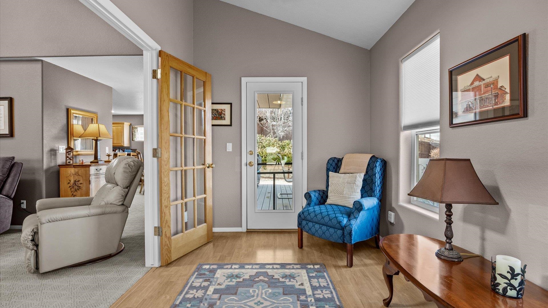 2344 1/2 Rattlesnake Court Grand Junction, CO 81507 - Photo 12 of 36 a living room with furniture and a lamp