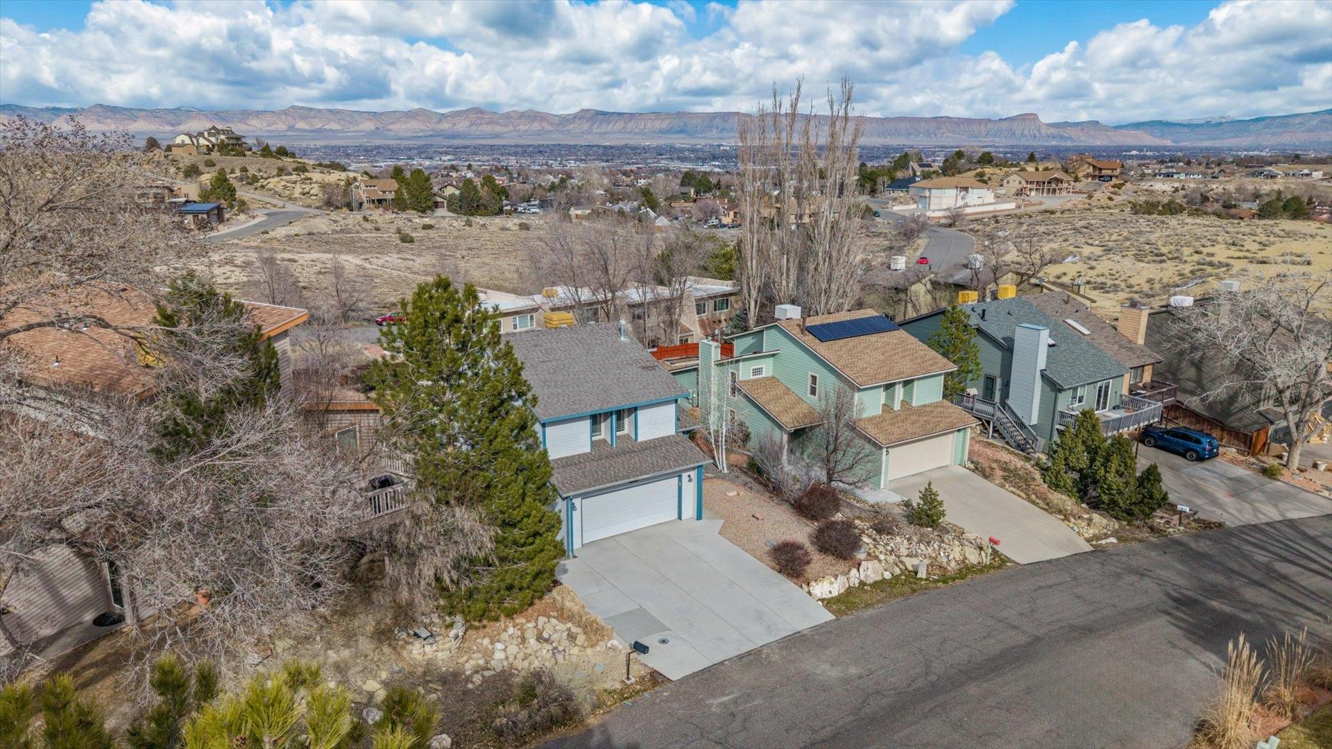 2344 1/2 Rattlesnake Court Grand Junction, CO 81507 - Photo 27 of 36 an aerial view of a house with a lake view