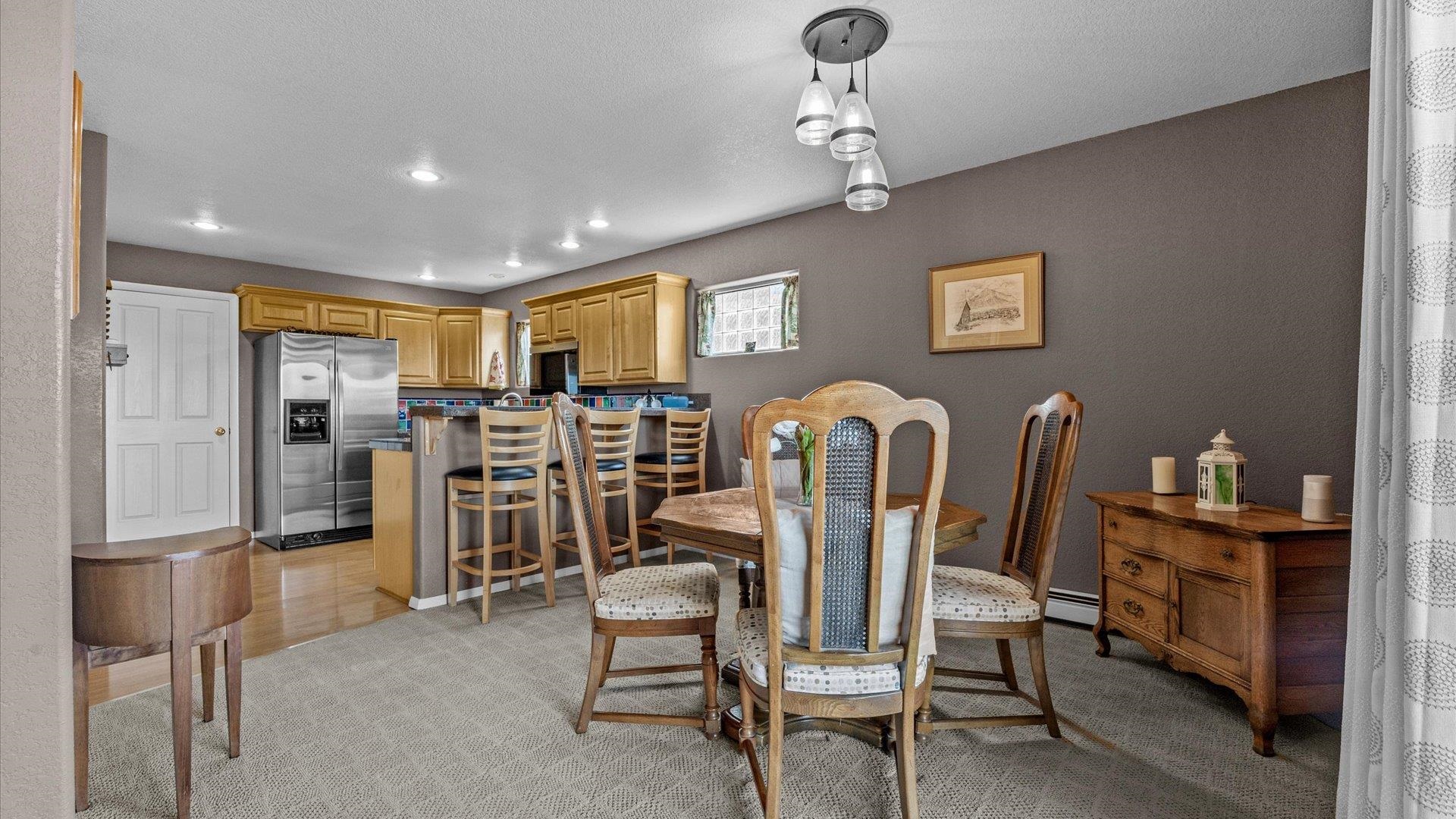 2344 1/2 Rattlesnake Court Grand Junction, CO 81507 - Photo 7 of 36 a view of a dining room with furniture