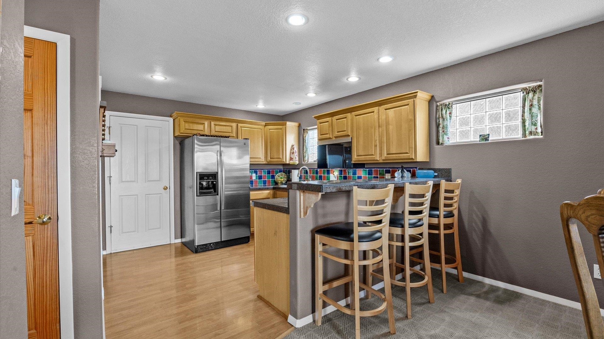 2344 1/2 Rattlesnake Court Grand Junction, CO 81507 - Photo 8 of 36 a view of a dining room with furniture