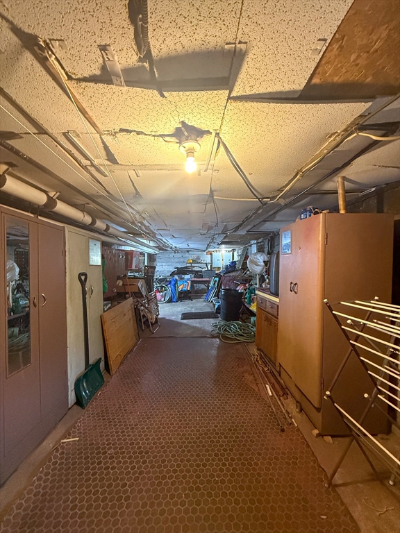 25 Clark Street Everett, MA 02149 - Photo 20 of 40 a view of a garage with storage