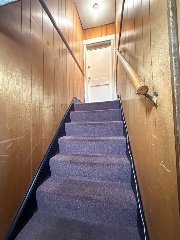 25 Clark Street Everett, MA 02149 - Photo 26 of 40 a view of staircase with wooden floor