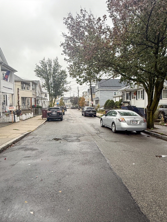 25 Clark Street Everett, MA 02149 - Photo 5 of 40 a car parked on the side of a street