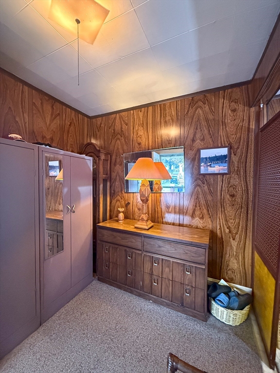 25 Clark Street Everett, MA 02149 - Photo 8 of 40 a kitchen with stainless steel appliances a refrigerator and a stove