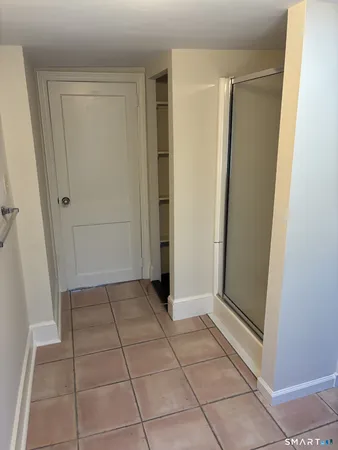 a view of a house with a snow on the road