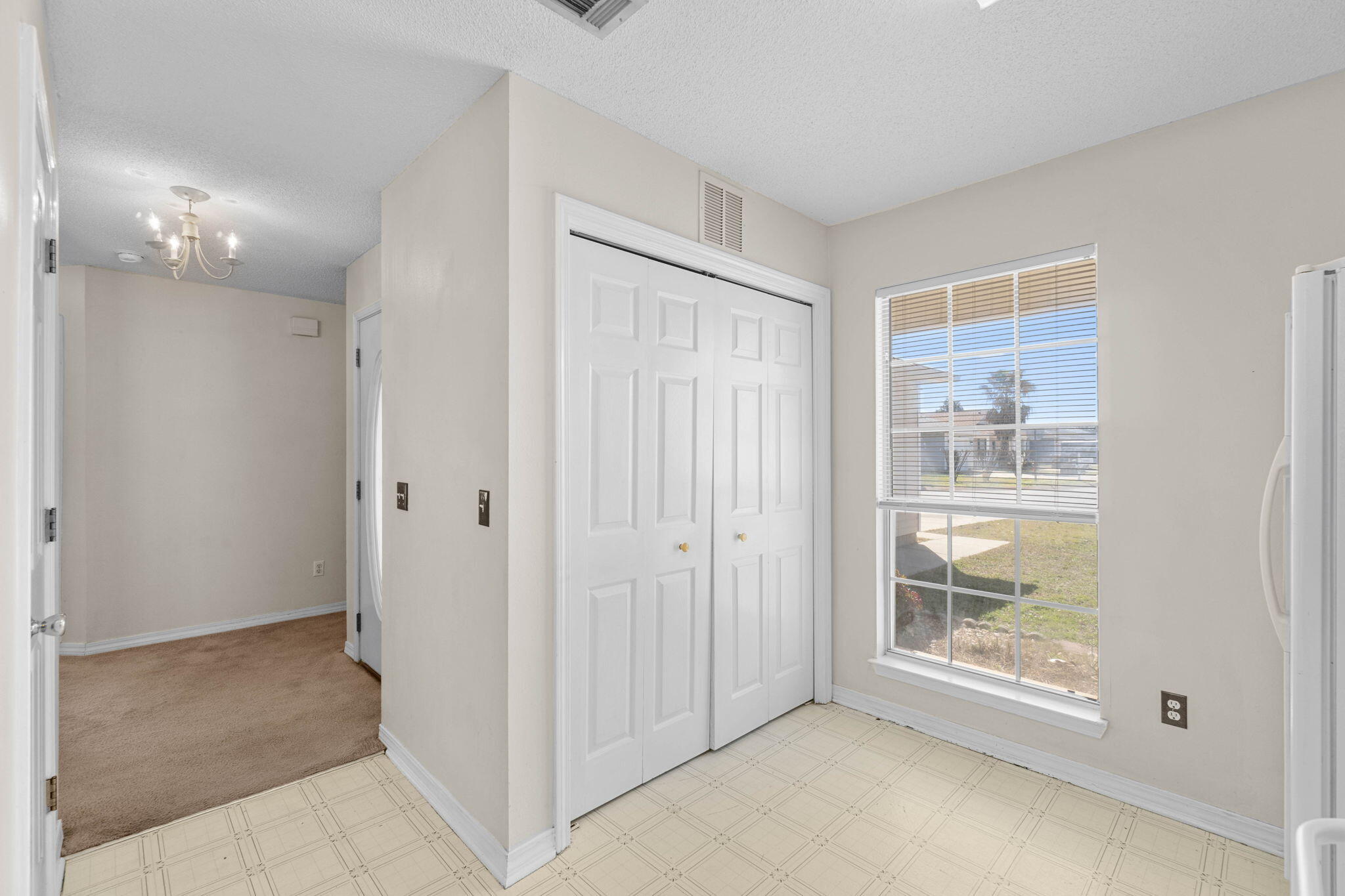 7612 Chablis Circle Navarre, FL 32566 - Photo 13 of 28 a view of an empty room with a window