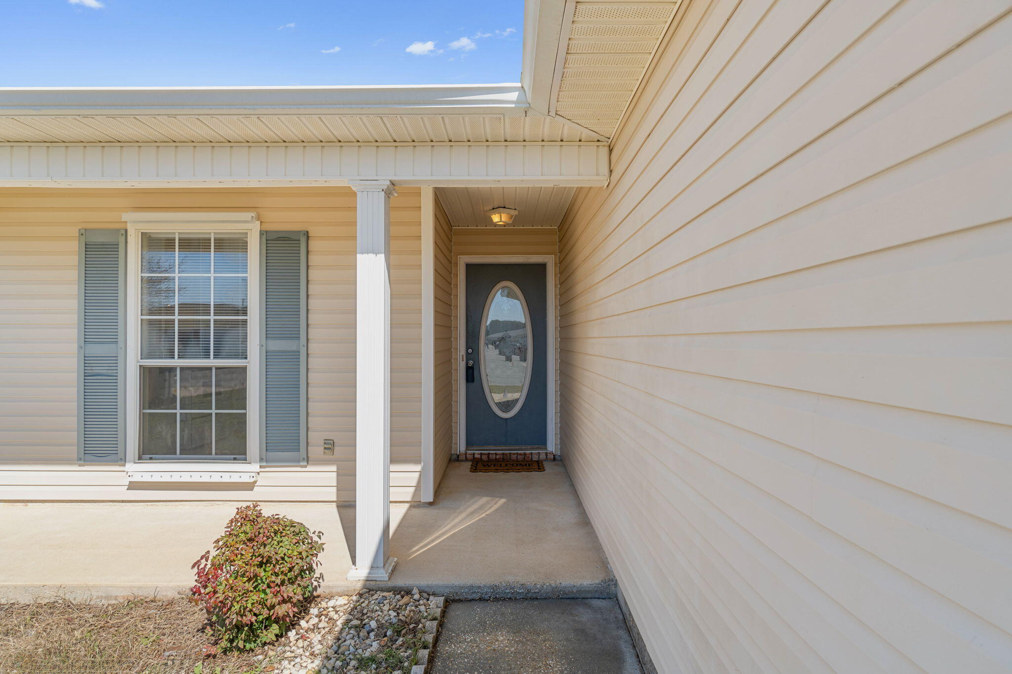 7612 Chablis Circle Navarre, FL 32566 - Photo 3 of 28 a view of a door and a window