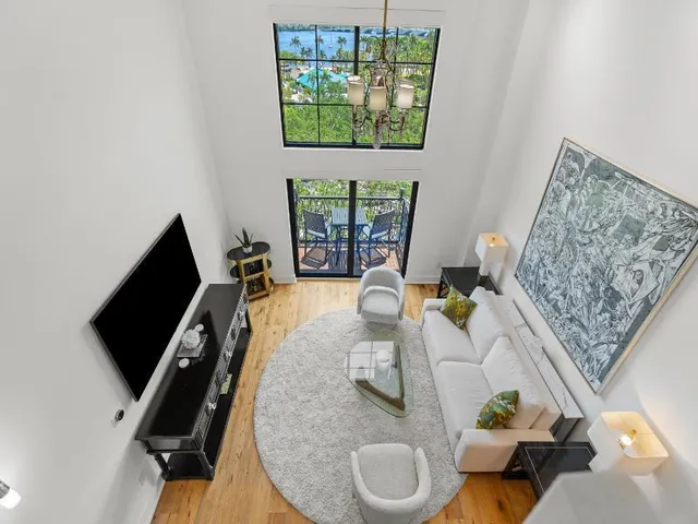 a bathroom with a sink toilet and mirror