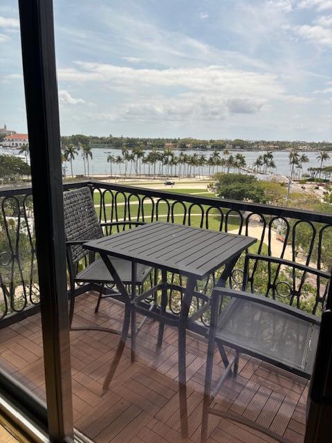 101 North Clematis Street, Unit 512 West Palm Beach, FL 33401 - Photo 16 of 17 a view of a chairs and table on the terrace