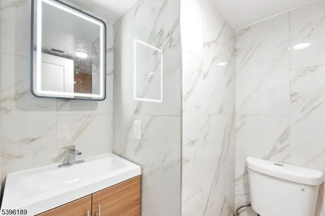 a bathroom with a shower curtain and a shower curtain