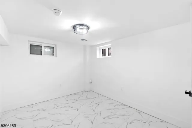 a view of a livingroom with wooden floor