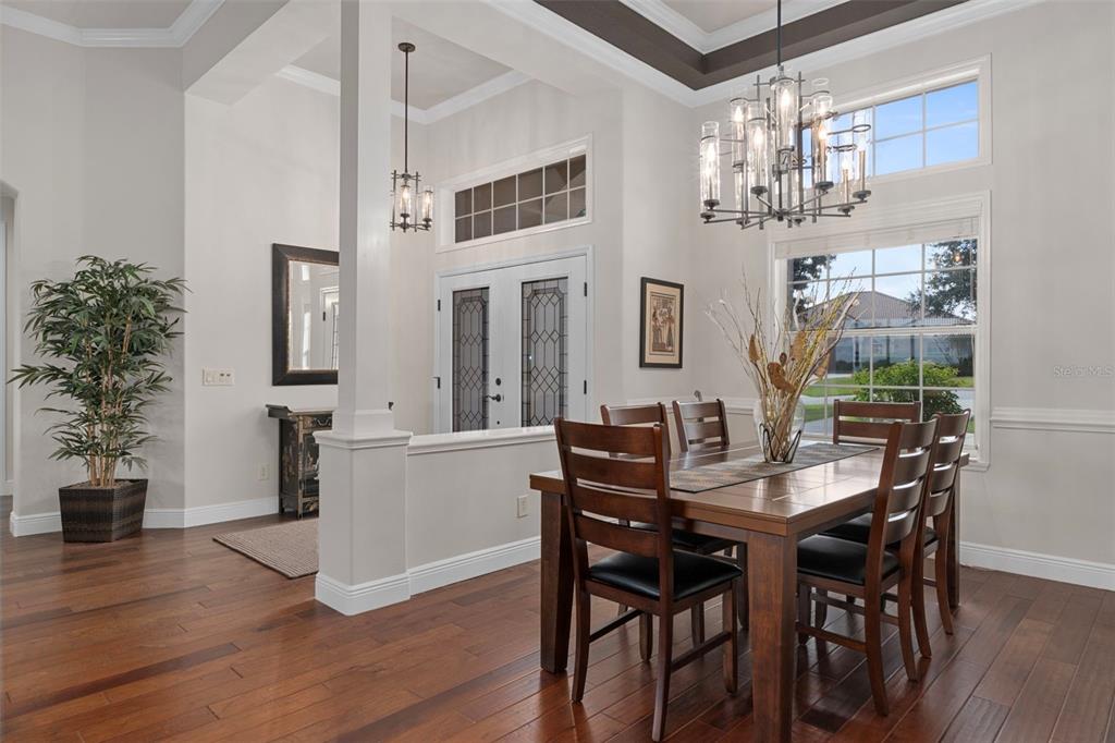 1601 North Tee Time Terrace Hernando, FL 34442 - Photo 23 of 69 a view of a dining room with furniture and wooden floor